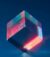 A vibrant and futuristic 3D cube with glowing edges on a dark blue background.